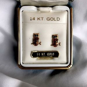 Beautiful 14 carat gold owl post earrings.